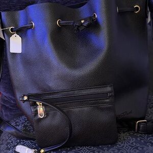 Elegant Black Leather Shoulder Bag with Pouch